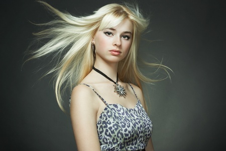 Fashion portrait of the young blonde womanの写真素材