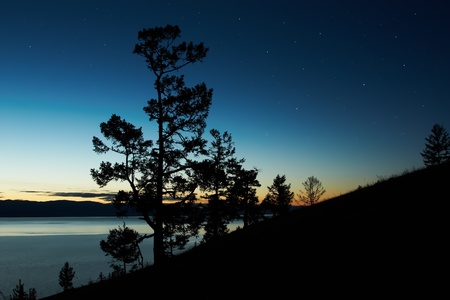 Night landscape against a decline lake Baikalの写真素材