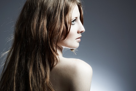 Portrait of the beautiful woman with red curly hairの写真素材