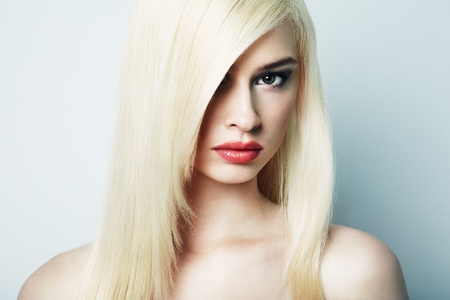 Fashion portrait of a young beautiful blonde womanの写真素材