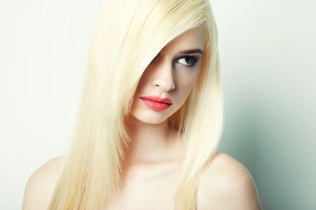 Fashion portrait of a young beautiful blonde womanの写真素材