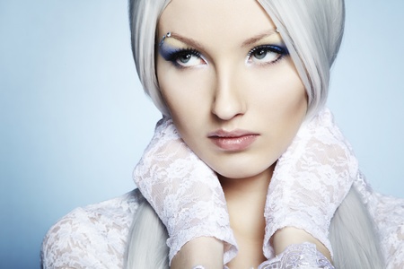 Fashion portrait of a young beautiful blonde woman. Winter Makeupの写真素材