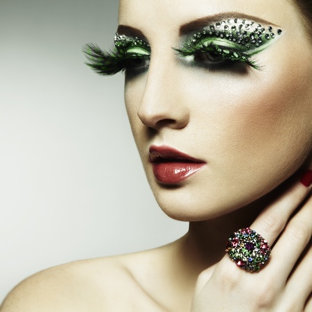 Fashion photo of a young woman with long eyelashes. Close-up portraitの写真素材