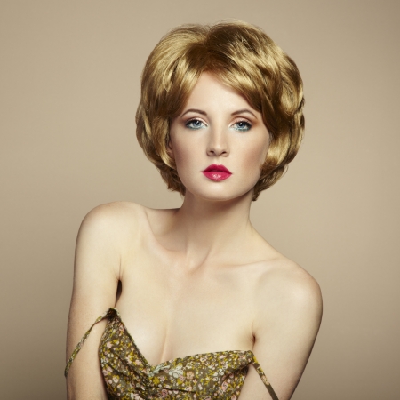 Portrait of beautiful sensual woman with elegant hairstyle. Retro hairdoの写真素材
