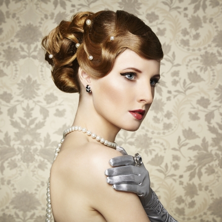 Retro portrait of  beautiful woman. Vintage style. Fashion photoの写真素材