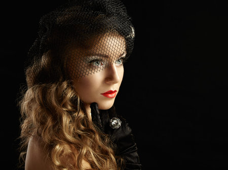 Retro portrait of  beautiful woman. Vintage style. Fashion photo