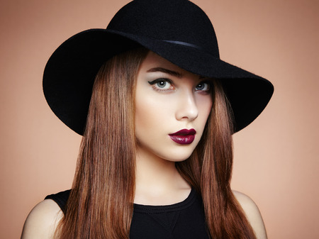 Fashion photo of young magnificent woman in hatの写真素材