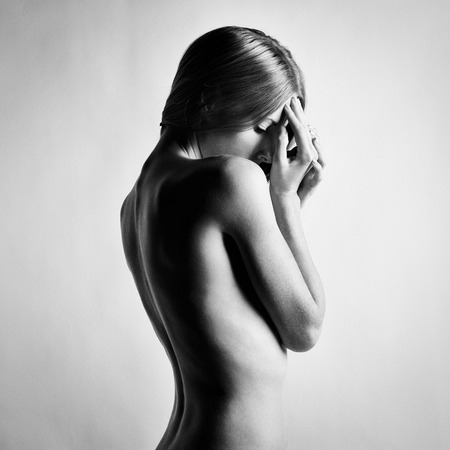 Fashion photo of beautiful nude woman. Black and white photographyの写真素材