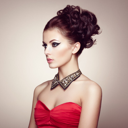Portrait of beautiful sensual woman with elegant hairstyle. Diamond collar. Perfect makeup. Fashion photoの写真素材