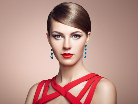 Fashion portrait of elegant woman with magnificent hair. Blonde girl. Perfect make-upの写真素材