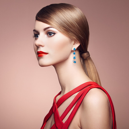 Fashion portrait of elegant woman with magnificent hair. Blonde girl. Perfect make-upの写真素材