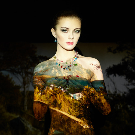 Beauty glamour portrait woman. Fashion concept photo. Art installation. Jewelry and makeup. Girl posingの写真素材