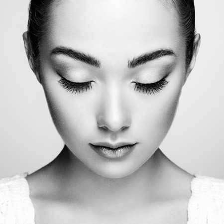 Beautiful woman face. Perfect makeup. Beauty fashion. Eyelashes. Cosmetic Eyeshadowの写真素材