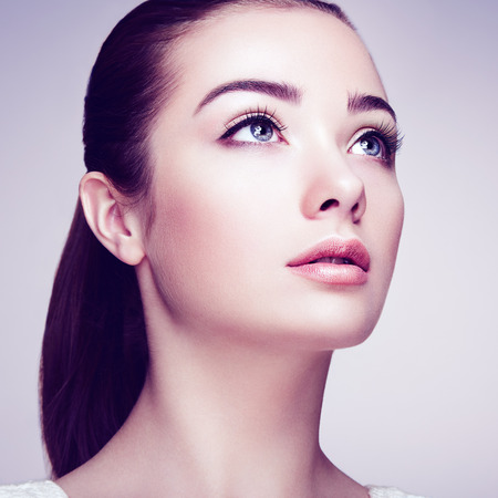 Beautiful woman face. Perfect makeup. Beauty fashion. Eyelashes. Cosmetic Eyeshadowの写真素材