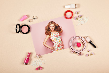 Fashion lady accessories collage. Falt Lay. Beauty photography. Lipstick and sunglasses. Jewelry and nail polish. Blonde young woman in floral spring summer dressの写真素材
