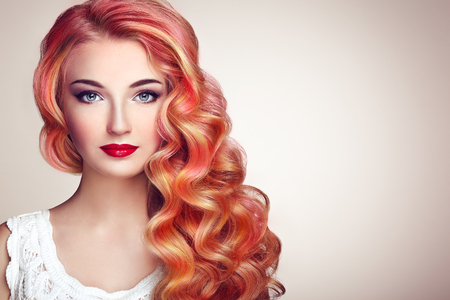 Beauty Fashion Model Girl with Colorful Dyed Hair. Girl with perfect Makeup and Hairstyle. Model with perfect Healthy Dyed Hair. Rainbow Hairstylesの写真素材