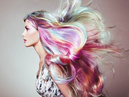 Beauty Fashion Model Girl with Colorful Dyed Hair. Girl with perfect Makeup and Hairstyle. Model with perfect Healthy Dyed Hair. Rainbow Hairstyles