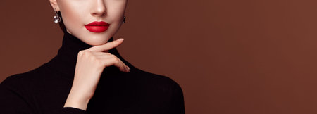 Beautiful Young Woman with Clean Fresh Skin. Perfect Makeup. Beauty Fashion. Red Lips. Cosmetic...