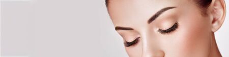 Beautiful Woman with Extreme Long False Eyelashes. Eyelash Extensions. Makeup, Cosmetics. Beauty, Skincareの写真素材