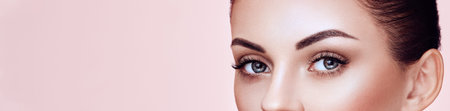 Beautiful Young Woman with Clean Fresh Skin. Perfect Makeup. Eyelashes. Eyelash Extensions....