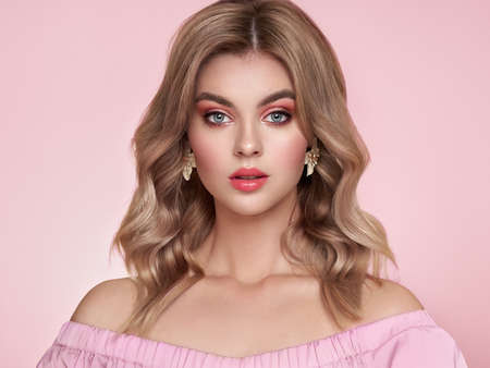 Beauty Fashion Model Woman with Colorful Dyed Hair. Girl with Perfect Makeup and Hairstyle. Model with Perfect Healthy Dyed Hair. Care and Beauty Hair Productsの写真素材