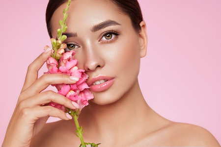 Portrait beautiful young woman with clean fresh skin. Model with healthy skin, close up portrait....