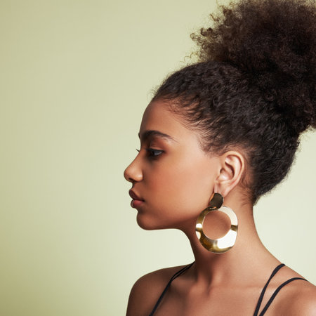 Beauty portrait of African American girl with afro hair. Beautiful black woman. Cosmetics, makeup and fashionの写真素材