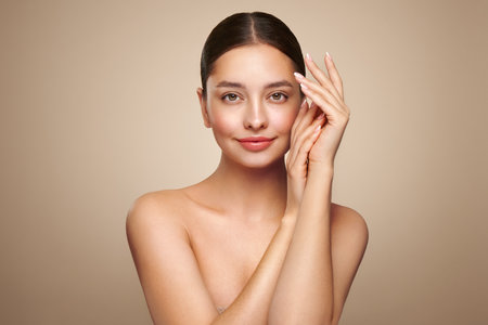 Portrait beautiful young woman with clean fresh skin. Model with healthy skin, close up portrait. Cosmetology, beauty and spaの写真素材