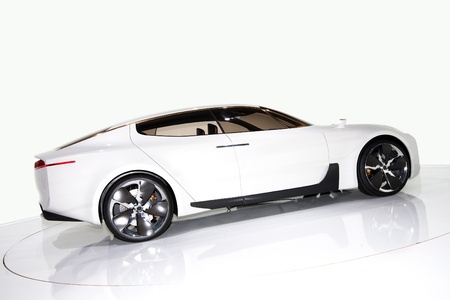 Futuristic white sports car on a platform, isolated backgroundのeditorial素材