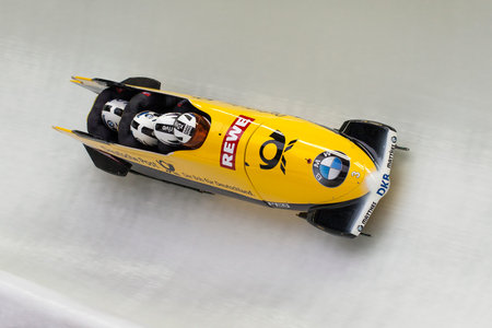 Bobsleigh athlete Maximilian Arndt of Germany competes with Alexander Roediger, Kevin Kuske and Martin Putze during the BMW IBSF World Cup Bob at Deutsche Post Eisarena on February 28, 2016 in Koenigssee, Germany.のeditorial素材