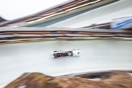 Bobsleigh athlete Justin Kripps of Canada competes with Alexander Kopacz, Joshua Kirkpatrick and Ben Coakwell during the BMW IBSF World Cup Bob at Deutsche Post Eisarena on February 28, 2016 in Koenigssee, Germany.のeditorial素材