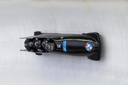 Bobsleigh athlete Lukas Kolb, from Austria competes with Markus Treichl, Franz Estherhammer and Sebastian Heufler during the BMW IBSF World Cup Bob at Deutsche Post Eisarena on February 28, 2016 in Koenigssee, Germany.のeditorial素材
