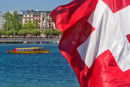 Switzerland Geneva Boat that crosses the lake in Geneva since 1897The boats are painted in the colors of the city in yellow and redの写真素材
