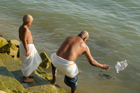 PANGKOR ISLAND, MALAYSIA - February 17, 2011 Masi Magam festival. To purify themselves, women, men and some children shave their hairのeditorial素材