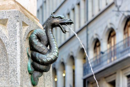 GENEVA SWITZERLAND : The fountain called Escalade located in the old city center is formed by a granite basin of Mont Blanc. The monument is composed of three levels: the first contains the names of the victims of the Escalade, the second of the bronze chのeditorial素材