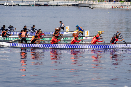 june 18, 2010 :  The finish is called by the helmsman to give more powerful or faster shots to go faster for the end of the race during the dragon boat festival on Putrajaya Lake Kuala Lumpur Malaysiaのeditorial素材