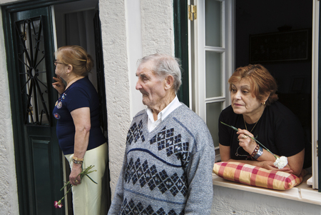 june 13, 2005 :  St. Anthony's Day, a great procession is organized. On the passage of the procession, women  wait for the statue of the saint to do a prayerのeditorial素材