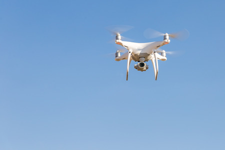 Drone fly in the blue skyの写真素材