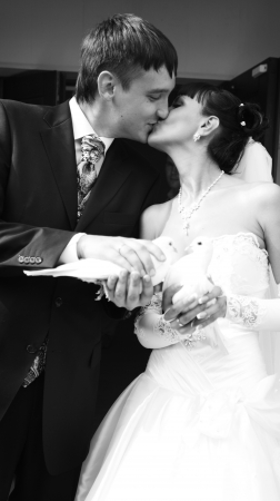 Bride and groom kissingの写真素材