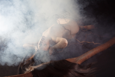 Nude girl in dampの写真素材