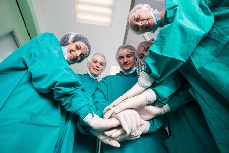 Happy surgeon team. Below viewの写真素材