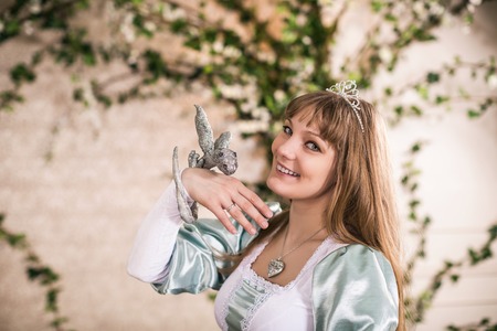 Photo of romantic woman in fairy gardenの写真素材