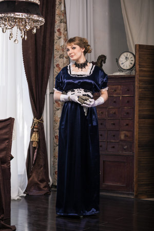 Elegant woman dressed in a Civil War era ball gown