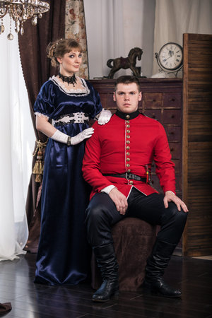 Portrait of a soldier and woman at homeの写真素材