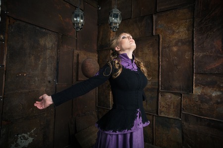 Elegant woman dressed in a Civil War era ball gownの写真素材