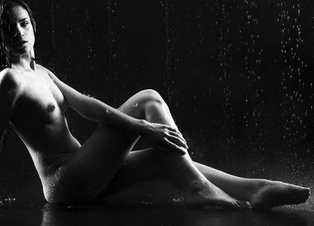 Sexy nude woman in water studioの写真素材