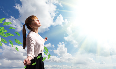 Portrait of happy teenage schoolgirl in formal clothesの写真素材