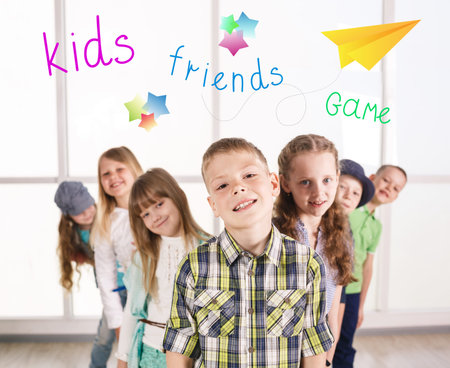 Group of smiling kids standing together