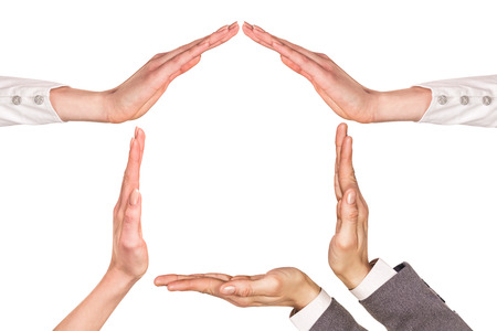 Symbol home from hands isolated on whiteの写真素材