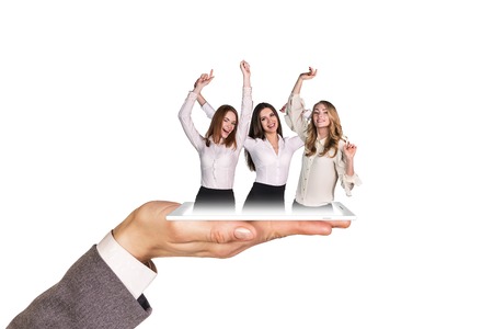 Open palm holds phone with girl on the white background.の写真素材